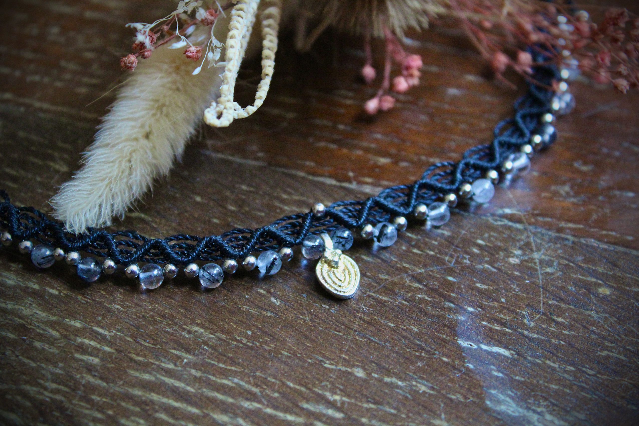 bracelet de cheville noir et argenté